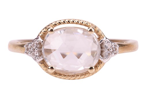 Lot 46 - A synthetic sapphire ring, featuring a central...