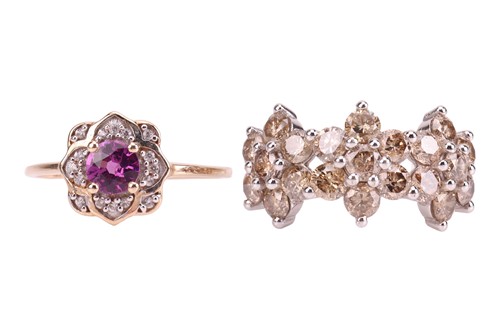 Lot 140 - Two rings; comprising a diamond-set floral...