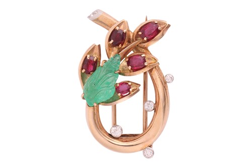 Lot 79 - Cartier - a spray clip brooch set with emerald,...