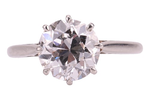 Lot 56 - A transitional-cut diamond solitaire ring,...