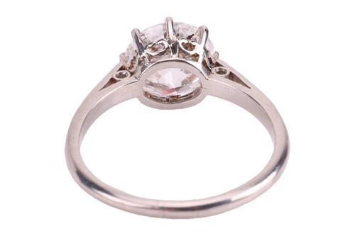 Lot 56 - A transitional-cut diamond solitaire ring,...