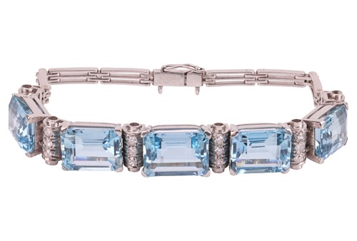 Lot 73 - An aquamarine and diamond link bracelet,...