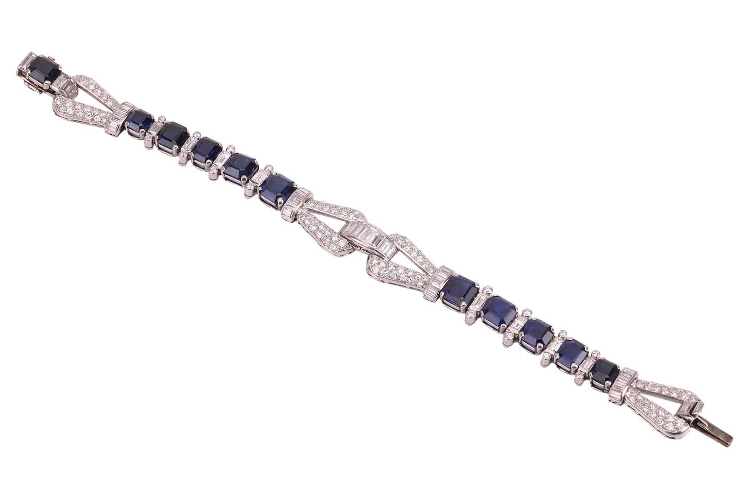 Lot 75 - A late Art Deco sapphire and diamond bracelet,...