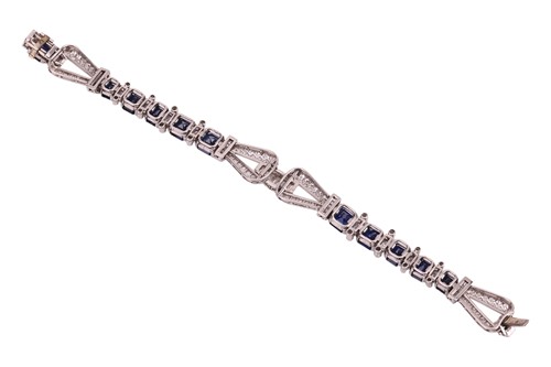 Lot 75 - A late Art Deco sapphire and diamond bracelet,...