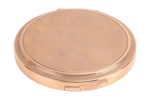 Lot 307 - A 9ct gold powder compact, of round form with...