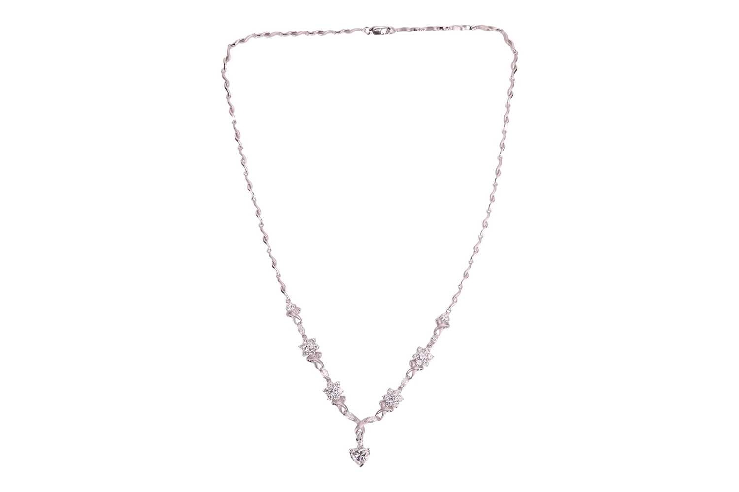 Lot 296 - A diamond-set necklace of floral design, with...