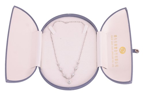 Lot 296 - A diamond-set necklace of floral design, with...