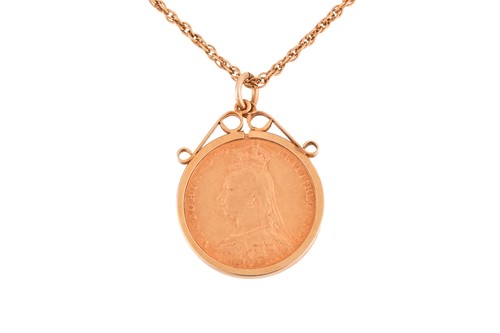 Lot 56 - A Victorian 1889 full sovereign in a 9ct gold...