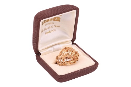 Lot 24 - A white sapphire dress ring, of foliate and...