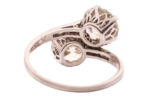 Lot 82 - An old European-cut diamond Toi et Moi ring,...