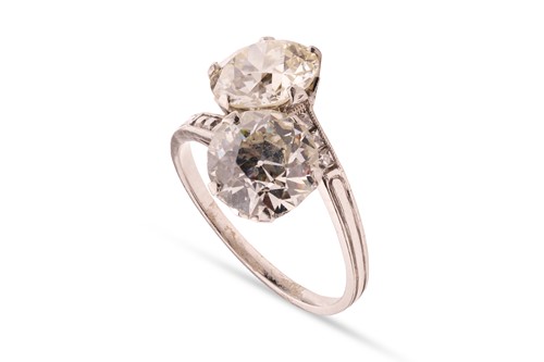 Lot 82 - An old European-cut diamond Toi et Moi ring,...