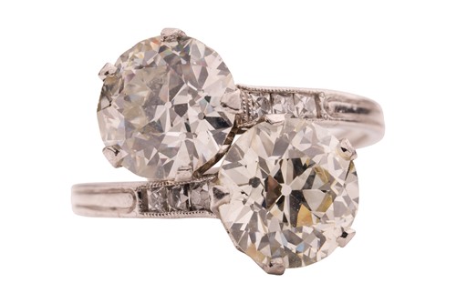 Lot 82 - An old European-cut diamond Toi et Moi ring,...