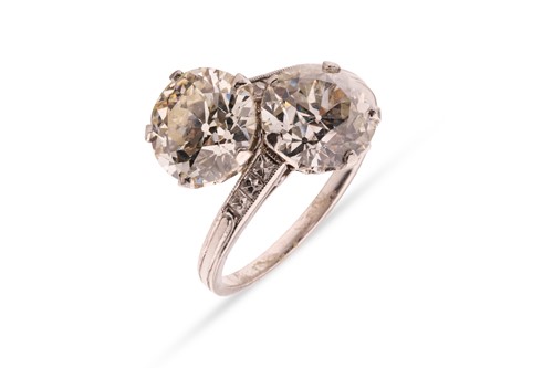 Lot 82 - An old European-cut diamond Toi et Moi ring,...