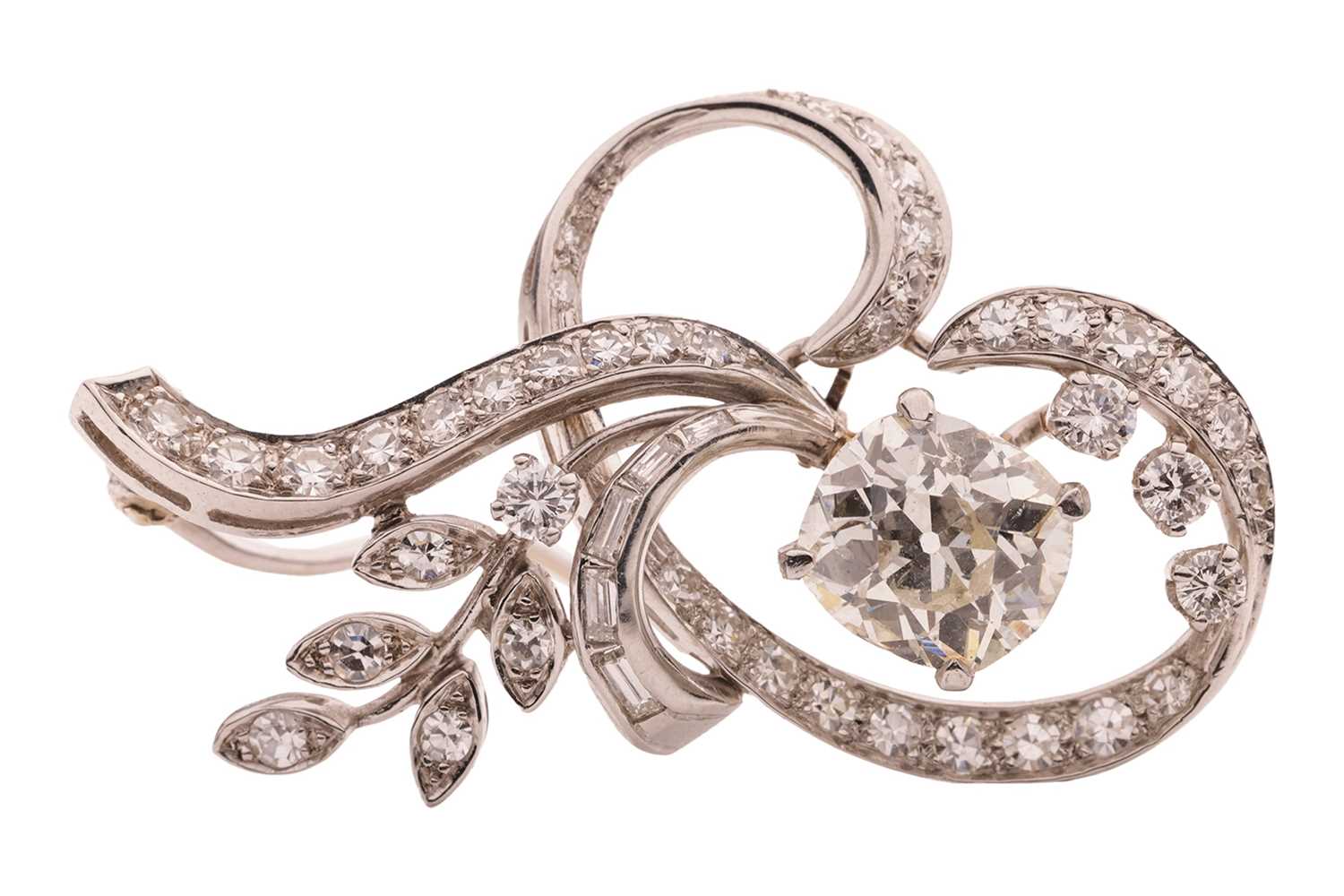 Lot 83 - A diamond-set spray brooch, featuring a...