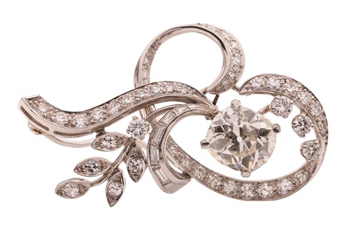 Lot 83 - A diamond-set spray brooch, featuring a...