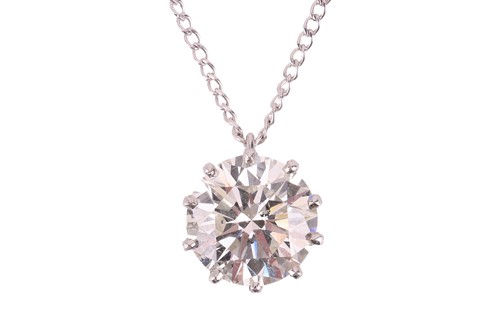 Lot 203 - A diamond pendant on chain, featuring a...