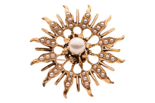 Lot 41 - A pearl-set sunburst brooch-cum-pendant,...
