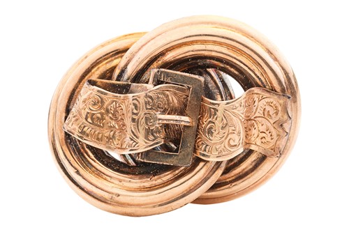 Lot 10 - A Victorian buckle brooch, featuring two...