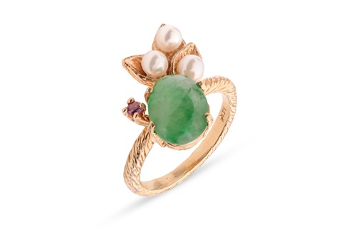 Lot 147 - A gem-set floral ring, claw-set in an oval...