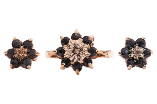 Lot 110 - A sapphire and diamond cluster ring and a pair...