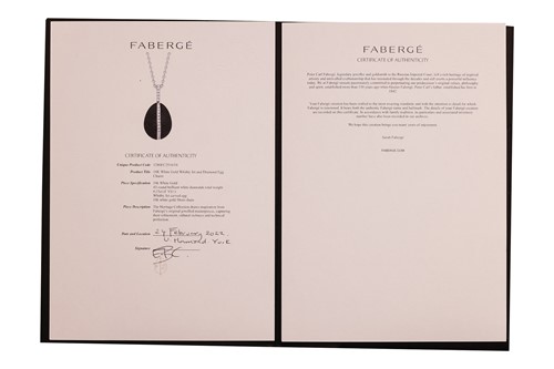 Lot 225 - Fabergé - A Whitby jet and diamond egg pendant...