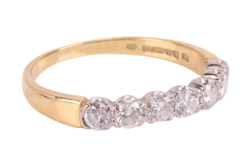 Lot 150 - A diamond half eternity ring, featuring seven...