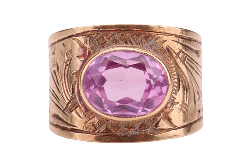 Lot 6 - A synthetic pink sapphire dress ring, the...
