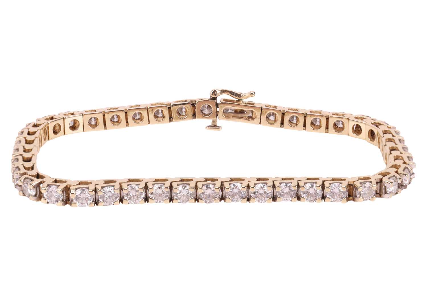 Lot 294 - A diamond tennis bracelet, featuring forty-two...