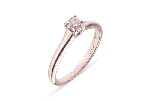 Lot 187 - Tiffany & Co - A diamond solitaire ring,...