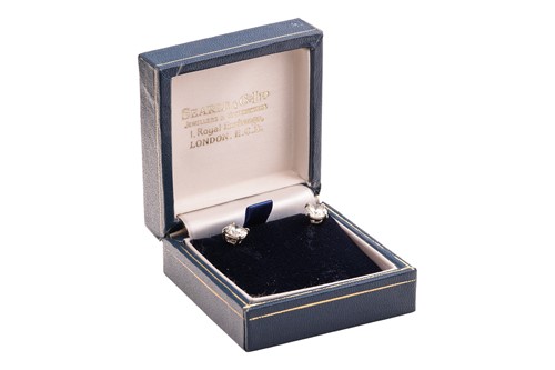Lot 299 - A pair of diamond stud earrings, with a total...