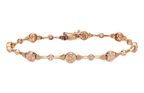 Lot 192 - A diamond-set bracelet, the row of eight...