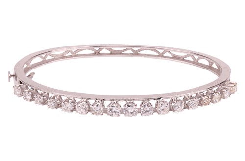 Lot 179 - A diamond-set hinged bangle, composed of 17...