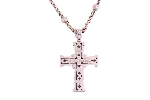 Lot 198 - Theo Fennell - A sapphire and diamond cross...
