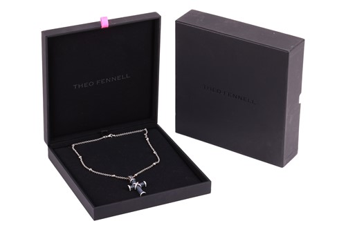 Lot 198 - Theo Fennell - A sapphire and diamond cross...