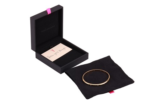 Lot 185 - Theo Fennell - A diamond-set closed bangle in...