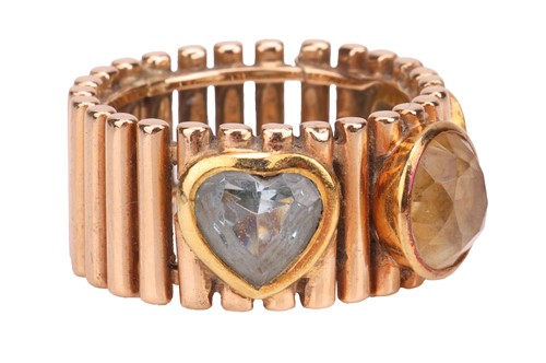 Lot 79 - A citrine and aquamarine dress ring, the wide...