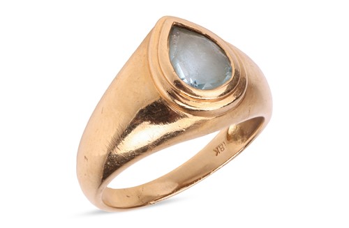 Lot 216 - A topaz dress ring, collet-set with a pear-cut...