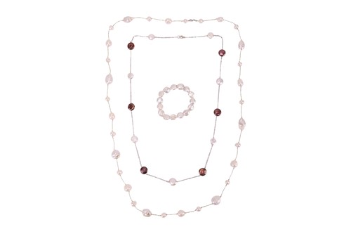 Lot 109 - Two pearl necklaces and a bracelet; The first...