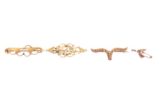 Lot 203 - Three brooches, comprising a yellow metal...