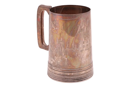 Lot 266 - A silver presentation pint tankard by Walker &...