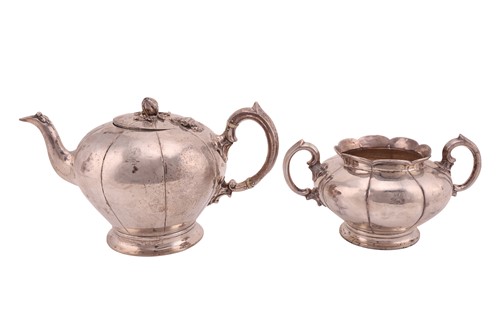 Lot 390 - A Victorian silver presentation teapot and...