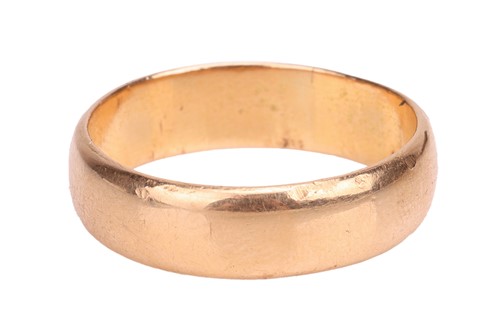 Lot 44 - A wide wedding band in 18ct yellow gold, the...