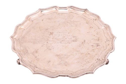 Lot 267 - A large silver presentation salver, by Adie...