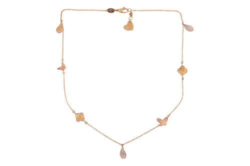 Lot 255 - A three-tone necklace, comprising segments of...