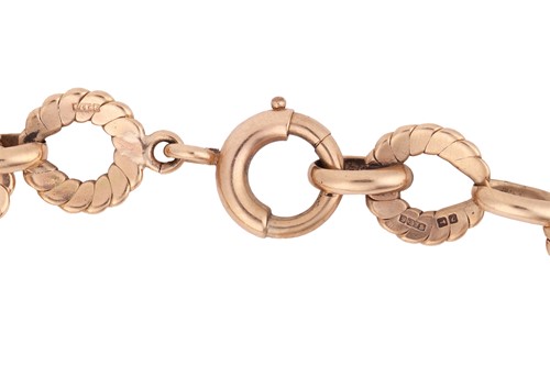 Lot 27 - A fancy link bracelet in 9ct yellow gold,...