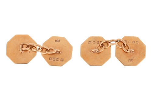 Lot 23 - A pair of hexagonal cufflinks in 9ct gold, the...