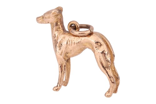 Lot 50 - A greyhound charm in 9ct gold, with suspension...