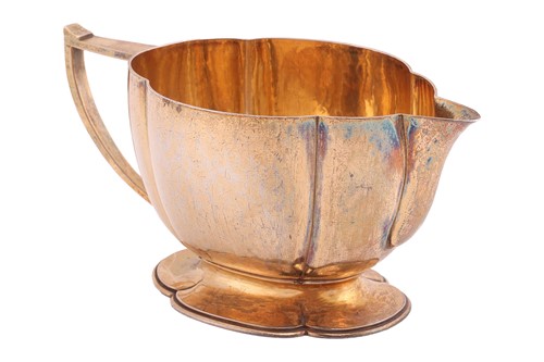 Lot 393 - Henry George Murphy - an Art Deco silver-gilt...