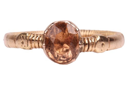 Lot 40 - A foiled-back yellow topaz dress ring, centred...