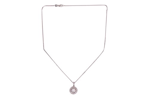 Lot 300 - An 18ct white gold diamond-set pendant on...